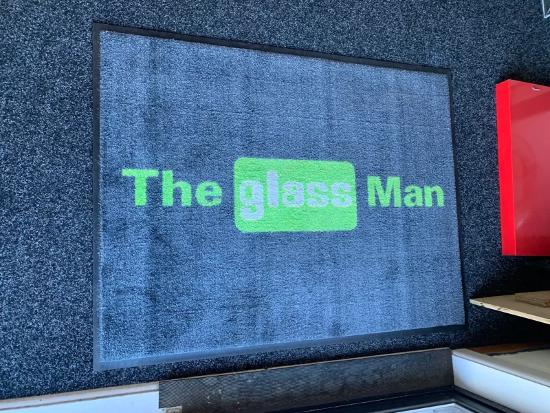 The Glassman Logo Mat