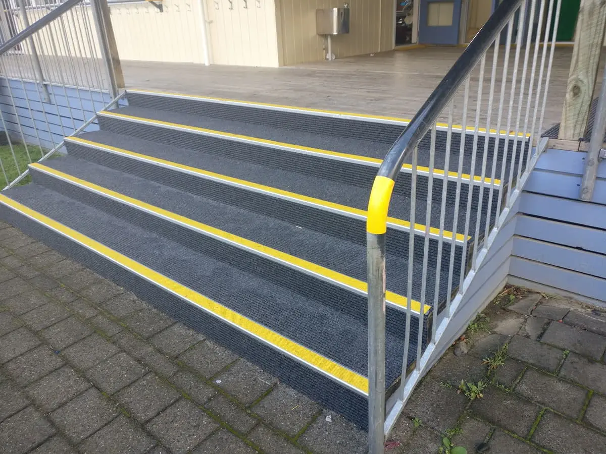 Slim Rib carpet on stairs with yellow stair nosings