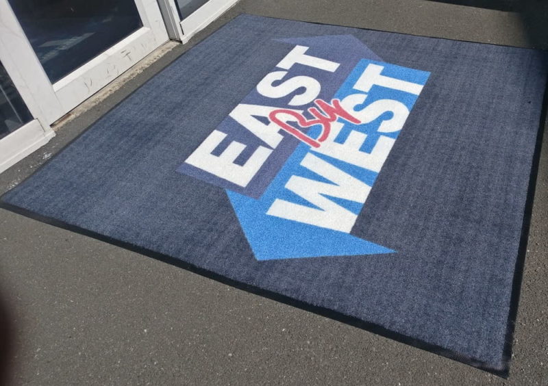 East West logo mat