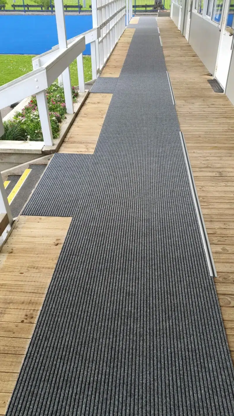 Marine carpet install on a deck with stair nosing